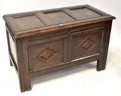 Lot 50 - A Georgian oak coffer, with fielded and...