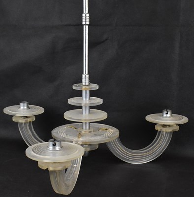 Lot 110 - An Art Deco clear plastic three-branch...