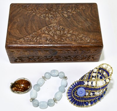 Lot 1582 - An unusual pearl bracelet, a polished...