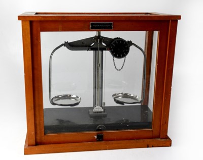 Lot 185 - A cased set of laboratory scales by Griffin &...