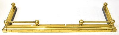 Lot 673 - A 19th century brass fender with rail to each...