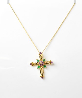 Lot 1085 - An 18ct yellow gold cross pendant set with a...
