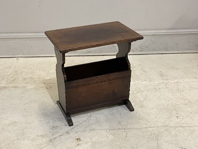 Lot 150 - A reproduction oak magazine rack/coffee table,...