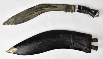 Lot 566 - A bone handled kukri knife, with lion's head...