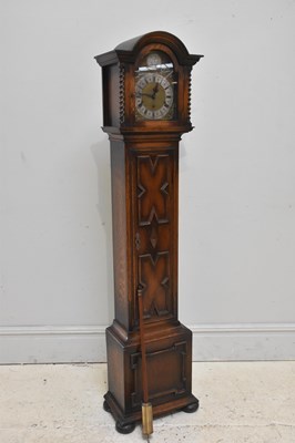 Lot 367 - A mid 20th century oak granddaughter clock,...