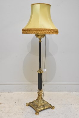 Lot 2040 - A gilt brass and green painted converted oil...