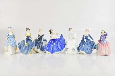 Lot 1131 - ROYAL DOULTON; seven assorted figures,...