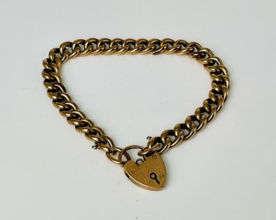 Lot 616 - A 9ct gold curb link bracelet, length 18cm,...