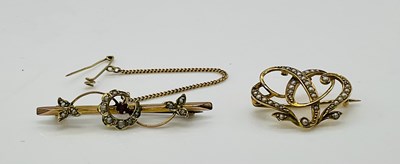 Lot 636 - A 9ct yellow gold seed pearl and pink sapphire...