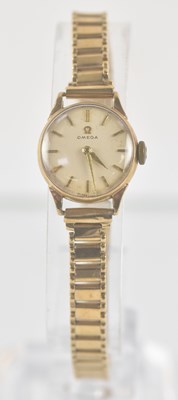 Lot 1616 - OMEGA; a vintage lady's 9ct yellow gold...