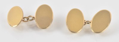 Lot 1437 - A pair of 9ct yellow gold oval face cufflinks,...