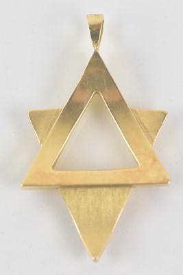 Lot 1384 - A yellow metal Star of David pendant,...