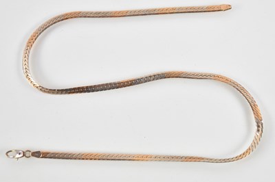 Lot 1386 - A 9ct tricolour gold semi-rigid flat link...