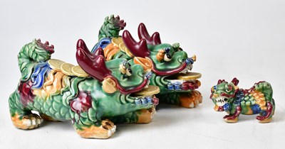 Lot 209 - A pair of temple lions in multicoloured glaze,...