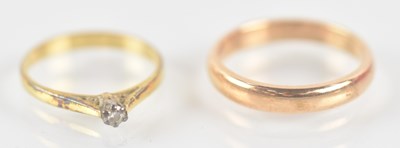 Lot 1329 - A 9ct yellow gold wedding band, size Q, and a...