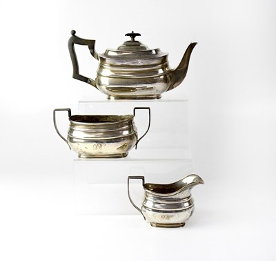Lot 863 - A George V hallmarked silver three-piece tea...