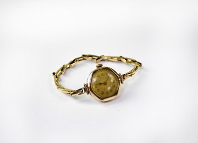 Lot 1301 - A 9ct gold ladies' wristwatch, stamped 375,...
