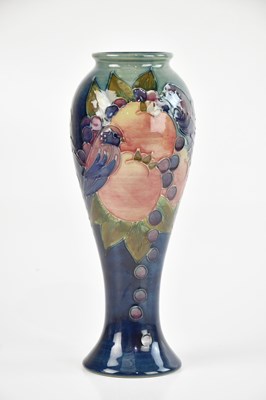 Lot 1856 - SALLY TUFFIN FOR MOORCROFT; a bulbous vase in...