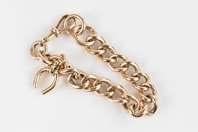 Lot 1101 - A 9ct gold heavy gauge flat link bracelet,...