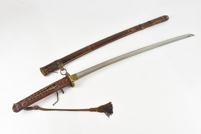 Lot 1713 - A Japanese WWII Katana, with leather mounted...
