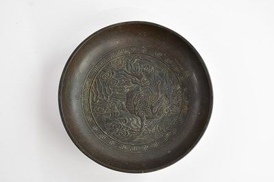 Lot 1563 - A Chinese bronze bowl, the central section...