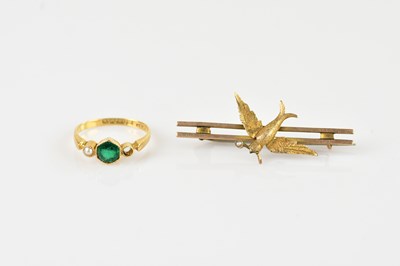 Lot 1345 - An 18ct yellow gold dress ring, set with a...