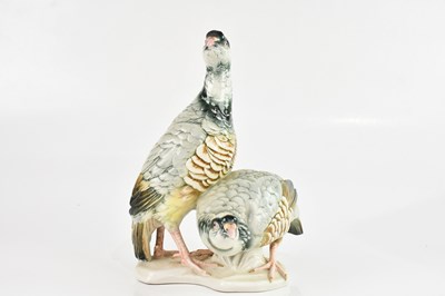 Lot 1786 - KARL ENZ; a ceramic figure of a pair of...
