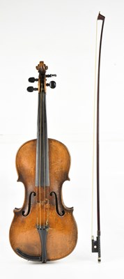 Lot 1312 - A full size German violin, with one-piece back...