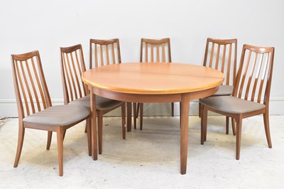 Lot 6 - G PLAN; a circular extending dining table,...