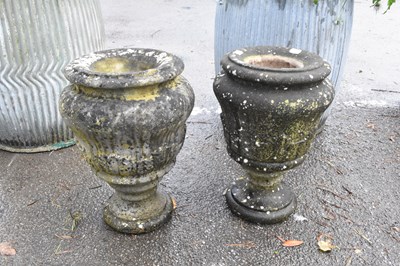 Lot 359 - Two stone garden urns, height of taller 38cm (2)