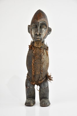 Lot 1504 - An African carved Teke figure, bound with...