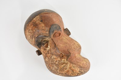 Lot 1502 - A Pende Mbuya sickness mask, height 31cm.