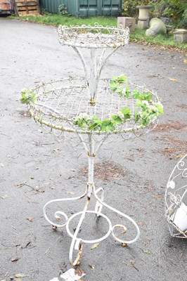 Lot 346 - A French white painted wirework two tier...