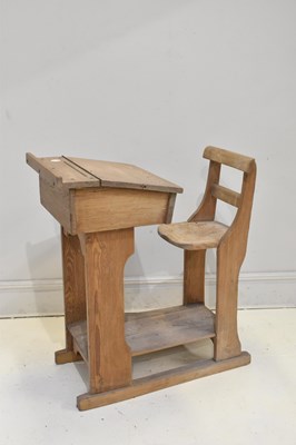 Lot 155 - An old pine school desk with chair, height...