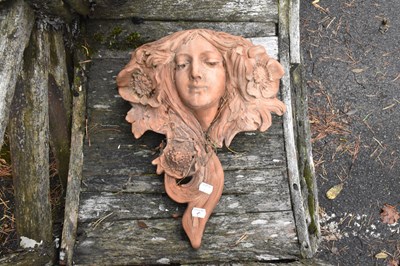 Lot 358 - A modern decorative terracotta wall planter in...