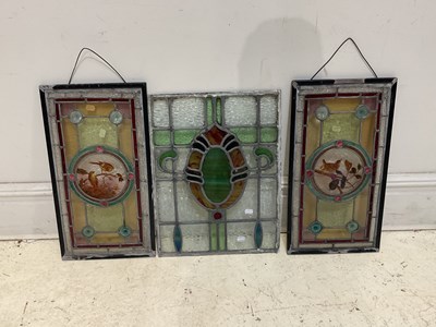 Lot 255 - A pair of Aesthetic Movement stained glass...