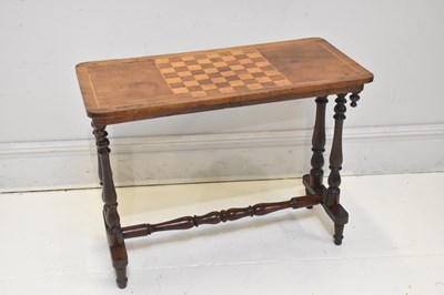 Lot 92 - A Victorian walnut side table with chessboard...