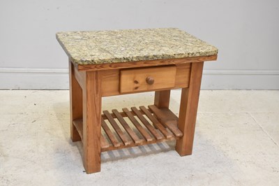 Lot 50 - A pine granite top single drawer kitchen...