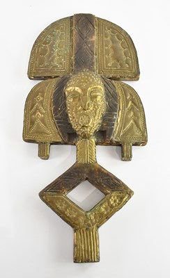 Lot 1519 - A Bakota reliquary Kota mask, with applied...