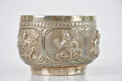 Lot 549 - An Indian white metal bowl with embossed...