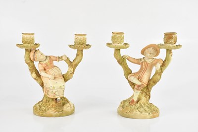 Lot 1738 - ROYAL WORCESTER; a pair of blush ivory figural...