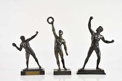 Lot 1215 - AFTER THE ANTIQUE; three bronzed spelter...