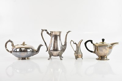 Lot 1446 - An Eastern white metal cream jug with engraved...