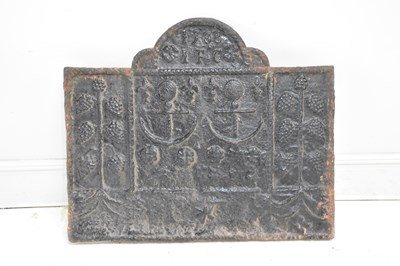 Lot 1170 - A cast iron fire back, with embossed anchors...
