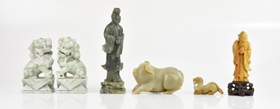 Lot 1626 - A pair of Chinese hardstone models of shishi...