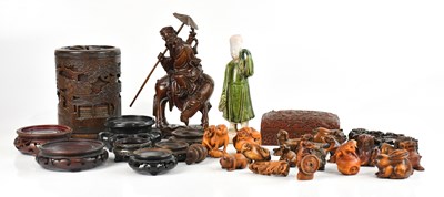 Lot 1730 - A Ming dynasty figure of an attendant, circa...