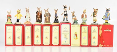 Lot 1878 - ROYAL DOULTON; a collection of eleven...