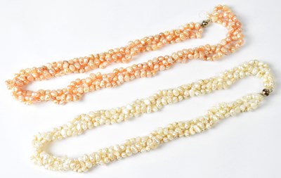 Lot 722 - Two three-strand plaited pearl necklaces with...