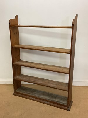 Lot 810 - A set of pine open book shelves, height 136cm,...