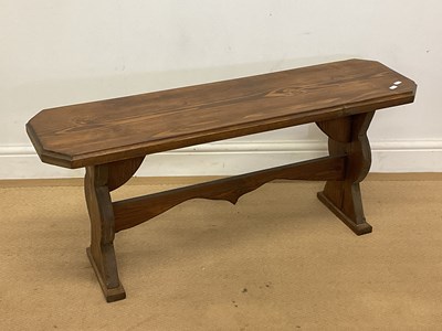Lot 789 - An oak bench with single support, height 44cm,...